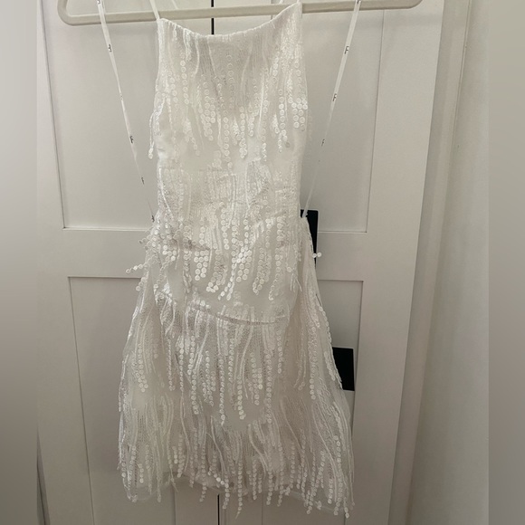 Lulus Dresses & Skirts - Lulu’s Making Magic White Fringe Lace-Up Mini Homecoming Dress